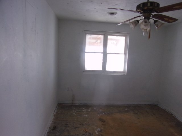 104 Algonquin Road Marquette Heights, IL 61554 - Photo 7 of 12 an empty room with a window