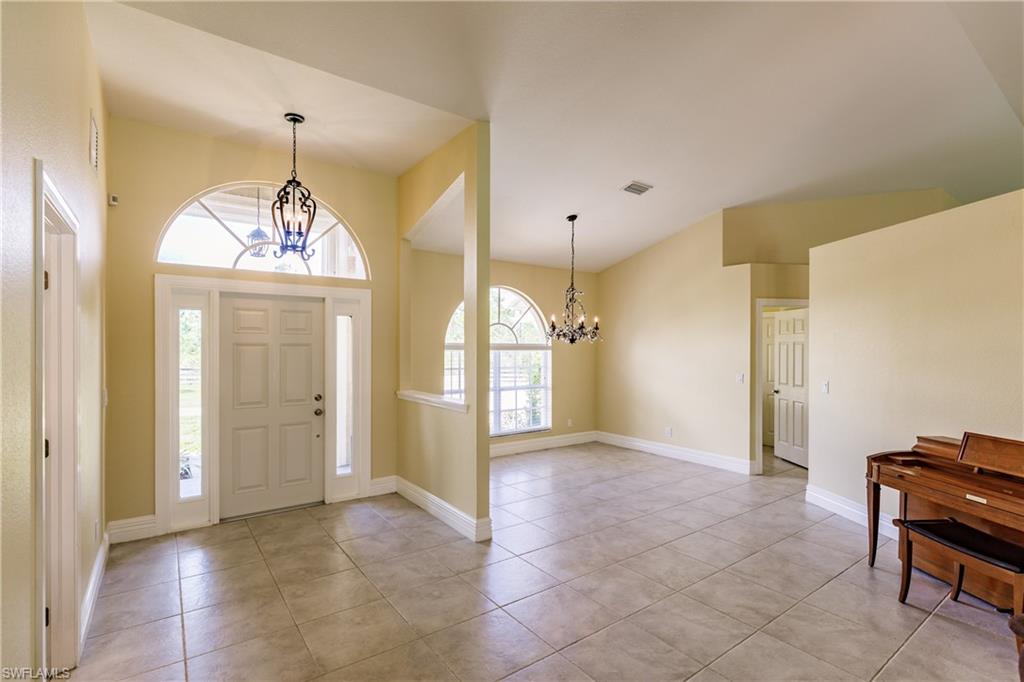 3881 Packinghouse Road Alva, FL 33920 - Photo 27 of 35 a view of a livingroom with a chandelier