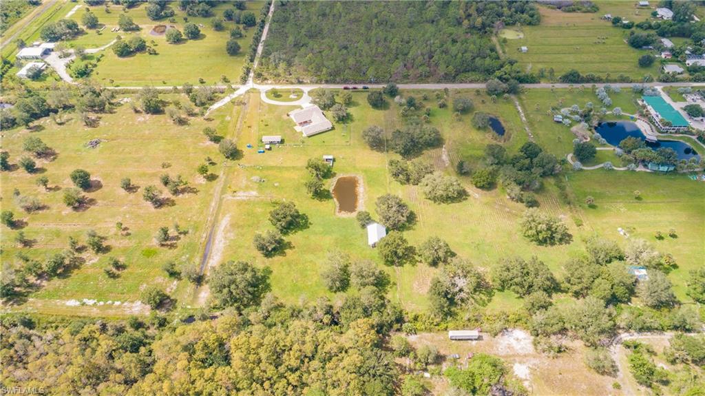 3881 Packinghouse Road Alva, FL 33920 - Photo 34 of 35 a view of swimming pool and mountain view