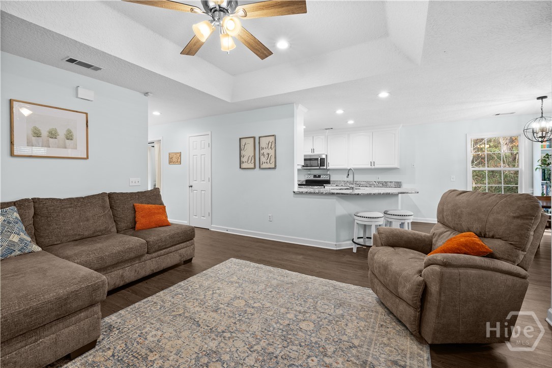2869 Rincon-Stillwell Road Rincon, GA 31326 - Photo 22 of 40 Family room with gas fireplace