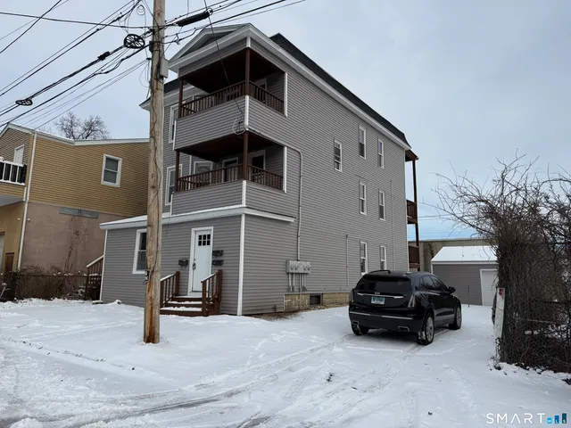 a car parked in front of a house