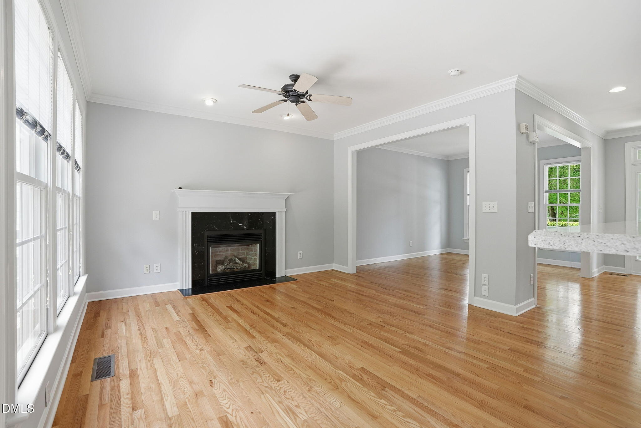 7 Morgans Ridge Lane Durham, NC 27707 - Photo 20 of 75 a view of an empty room with wooden floor and a window