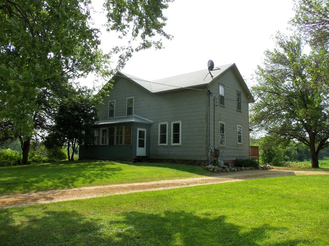 17419 Hebron Road Harvard, IL 60033 - Photo 13 of 22 a front view of house with yard and green space