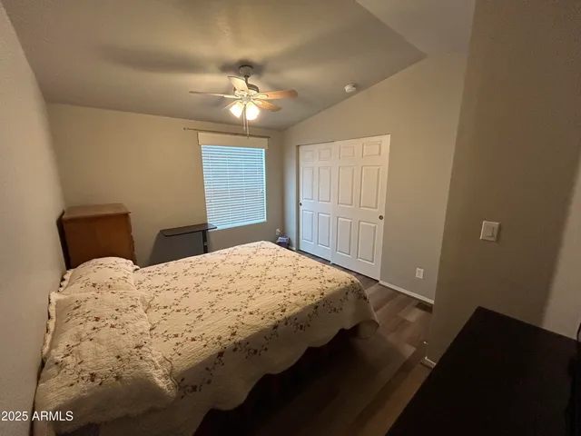 a kitchen with a refrigerator and a sink