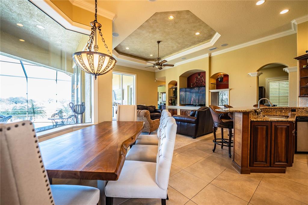 2918 Clubhouse Road Lakeland, FL 33812 - Photo 13 of 47 a view of a dining room with furniture window and outside view