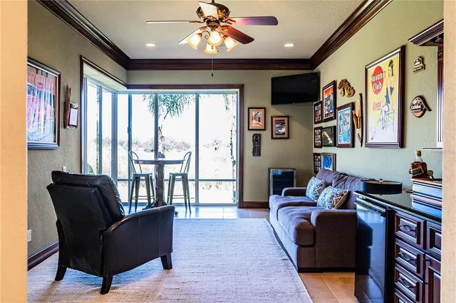 a living room with furniture and a rug