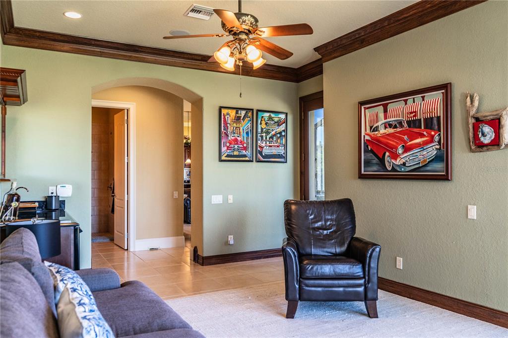 2918 Clubhouse Road Lakeland, FL 33812 - Photo 22 of 47 a living room with furniture and a rug