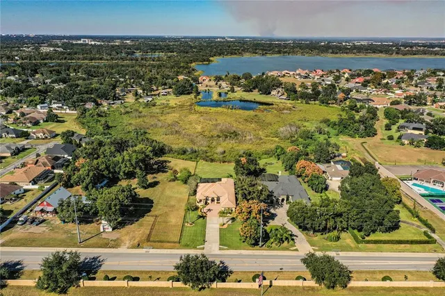 a view of a livingroom with furniture and a chandelier