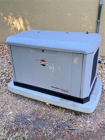 a view of a house with swimming pool and sitting area