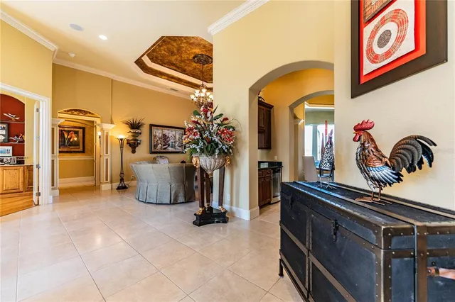 a view of a chairs and a table in the balcony
