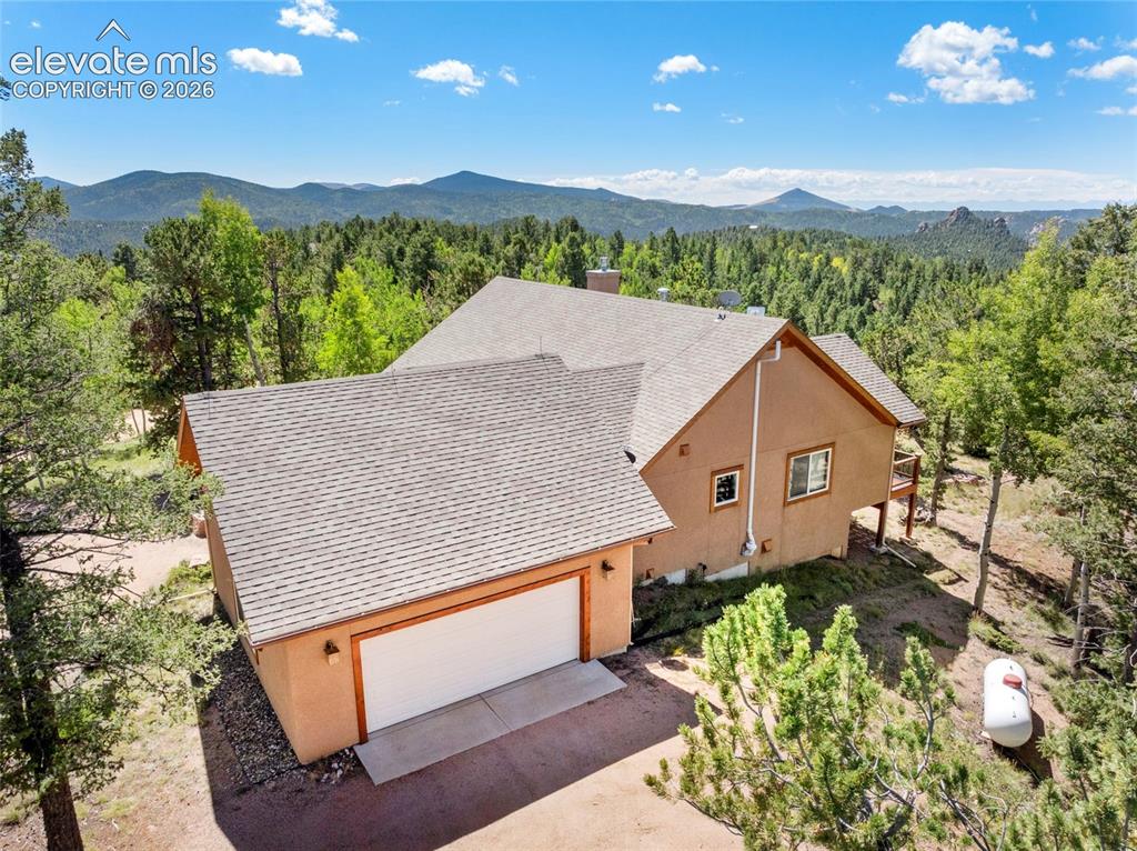 131 Paradiso Road Divide, CO 80814 - Photo 3 of 50 a aerial view of a house