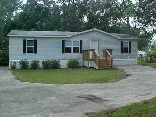 2040 Mullet Road Auburndale, FL 33823 - Photo 1 of 1 a view of a house with backyard