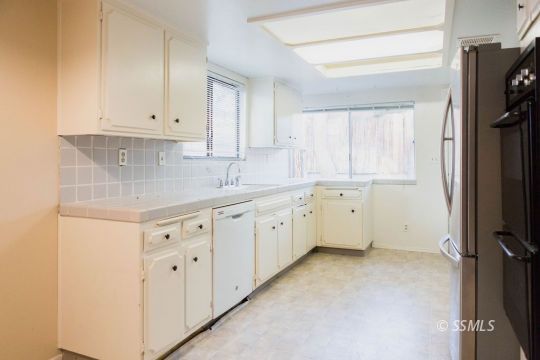 543 South Warner Street Ridgecrest, CA 93555 - Photo 10 of 27 a view of a kitchen with sink