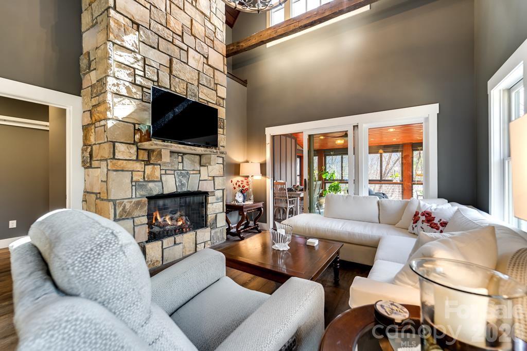 117 Amberleaf Way Cullowhee, NC 28723 - Photo 15 of 48 a living room with fireplace furniture and a flat screen tv