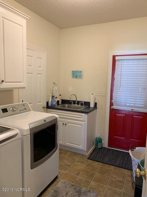 390 Shellcastle Road Rocky Mount, NC 27804 - Photo 17 of 19 shellcastle laundry room