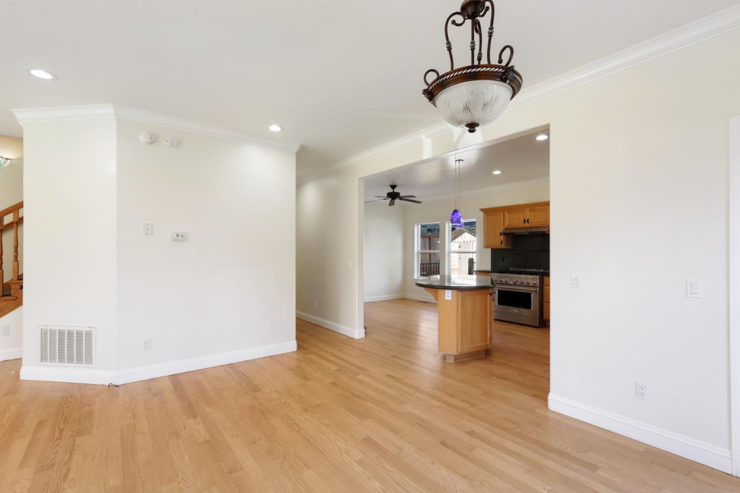 12930 Ridge Road Grass Valley, CA 95945 - Photo 11 of 62 a view of living room with a white cabinets and wooden floor