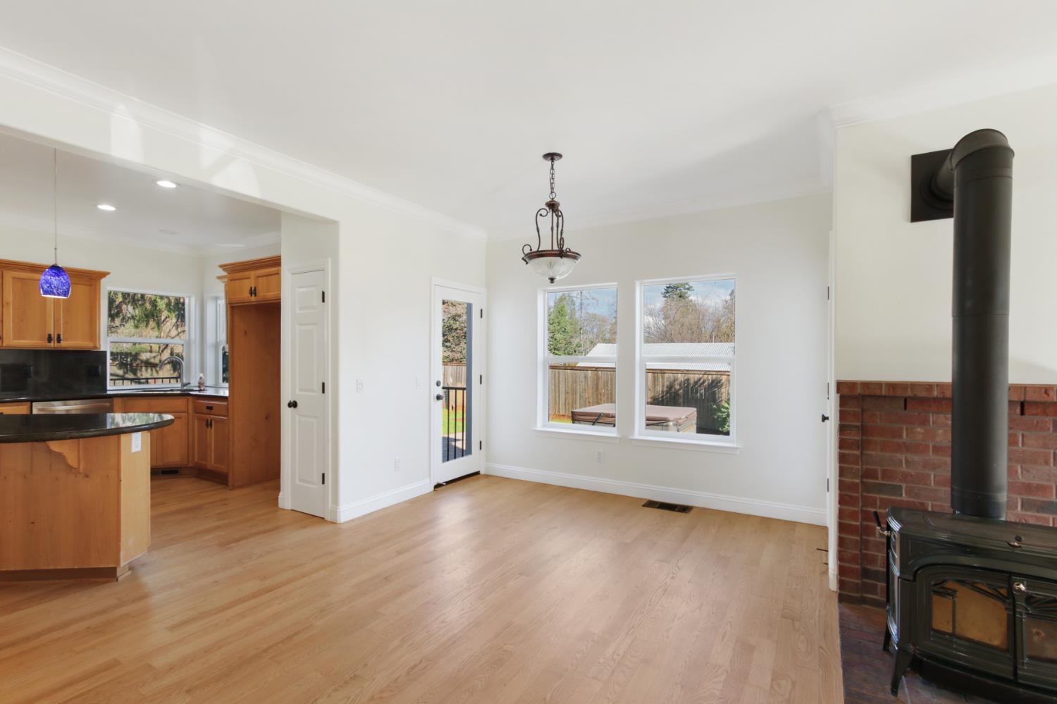 12930 Ridge Road Grass Valley, CA 95945 - Photo 13 of 62 a view of livingroom with furniture wooden floor and window
