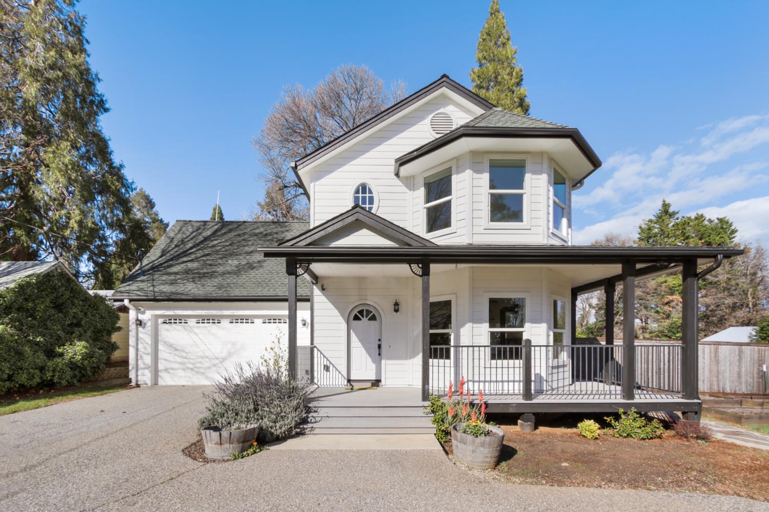 12930 Ridge Road Grass Valley, CA 95945 - Photo 2 of 62 a front view of a house
