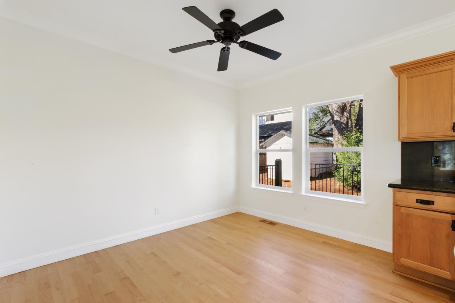 12930 Ridge Road Grass Valley, CA 95945 - Photo 26 of 62 a view of a livingroom with a window and a ceiling fan