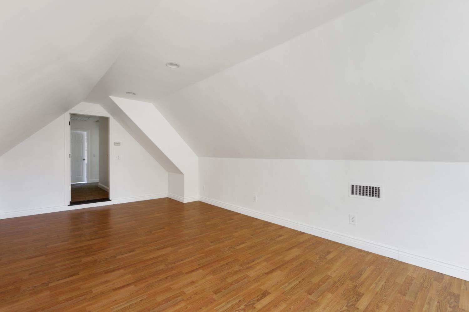 12930 Ridge Road Grass Valley, CA 95945 - Photo 28 of 62 a view of empty room with wooden floor