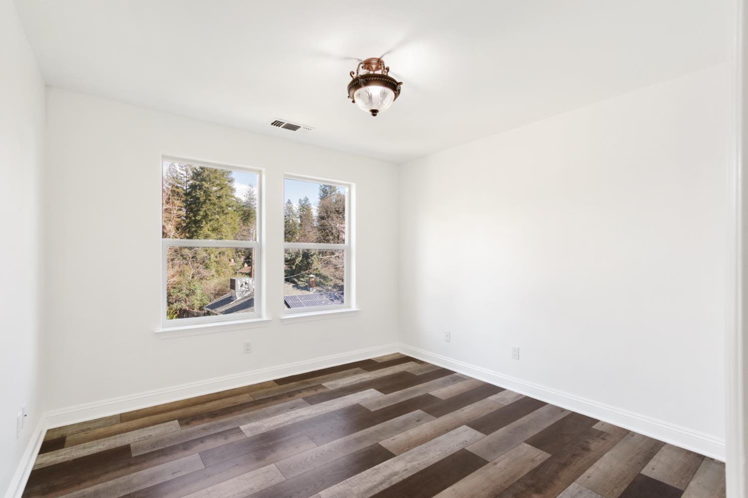 12930 Ridge Road Grass Valley, CA 95945 - Photo 36 of 62 an empty room with a window