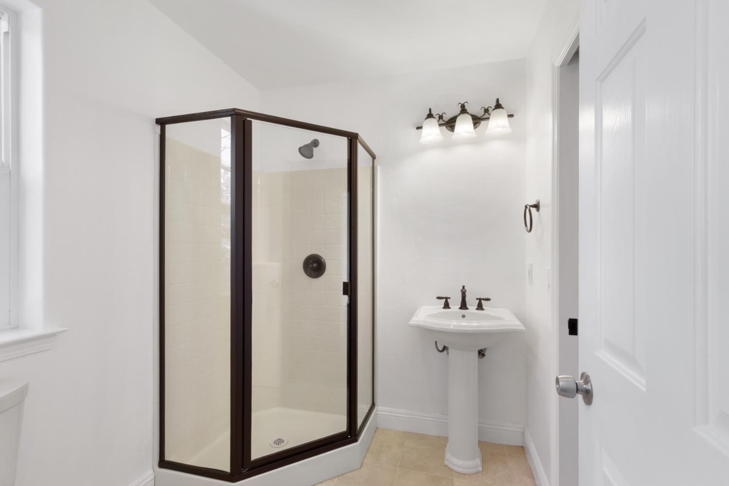 12930 Ridge Road Grass Valley, CA 95945 - Photo 39 of 62 a bathroom with a sink and a mirror