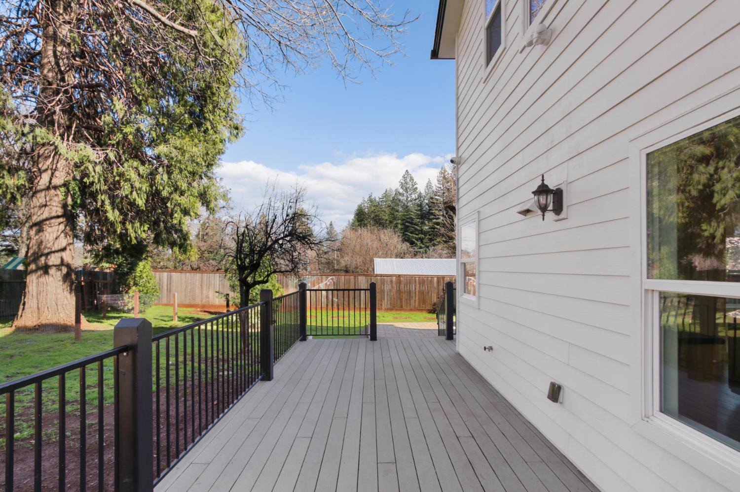 12930 Ridge Road Grass Valley, CA 95945 - Photo 45 of 62 a view of a house with a deck
