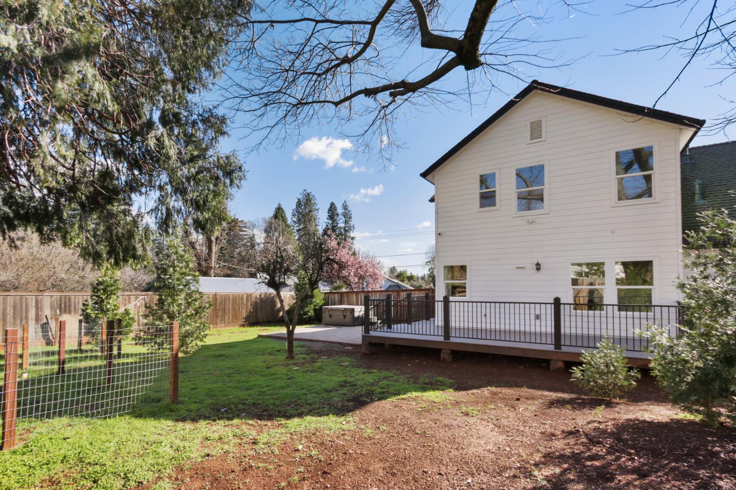 12930 Ridge Road Grass Valley, CA 95945 - Photo 49 of 62 a view of a house with backyard and sitting area
