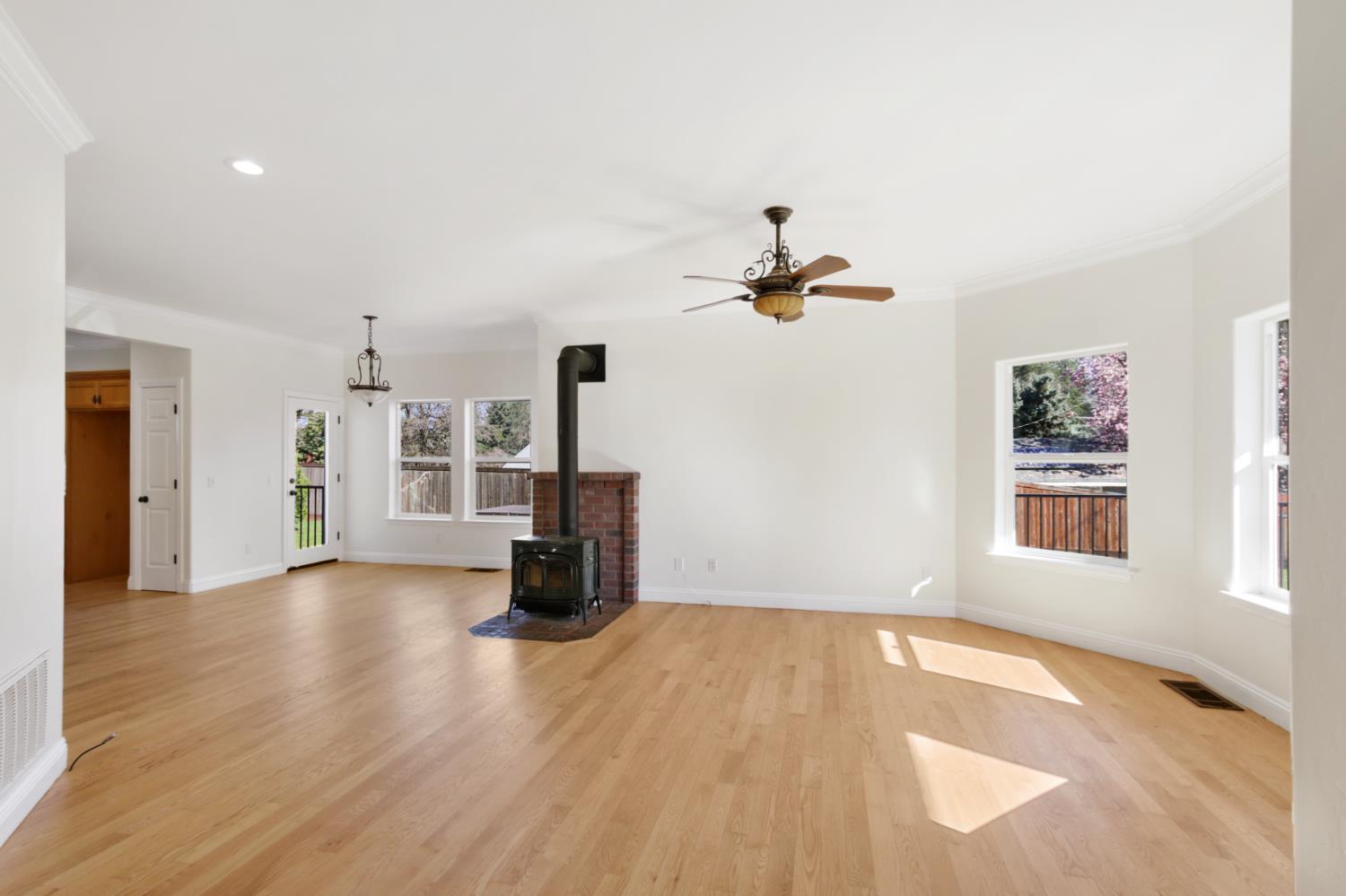 12930 Ridge Road Grass Valley, CA 95945 - Photo 5 of 62 a view of empty room with a window and fireplace