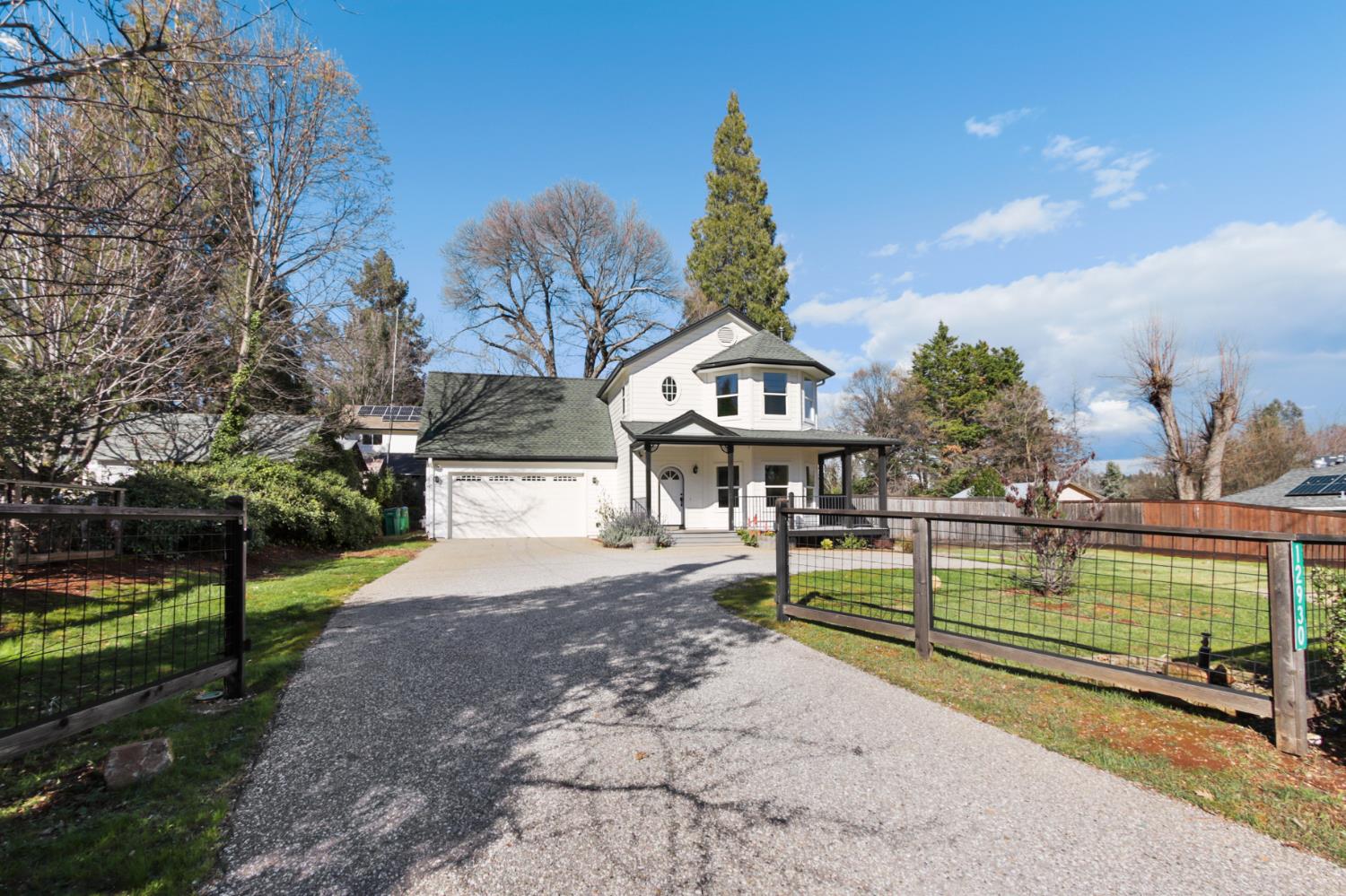 12930 Ridge Road Grass Valley, CA 95945 - Photo 53 of 62 a view of a house with a yard and furniture