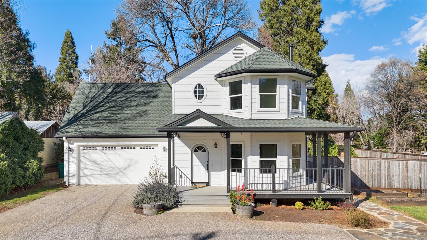 12930 Ridge Road Grass Valley, CA 95945 - Photo 54 of 62 a front view of a house with porch