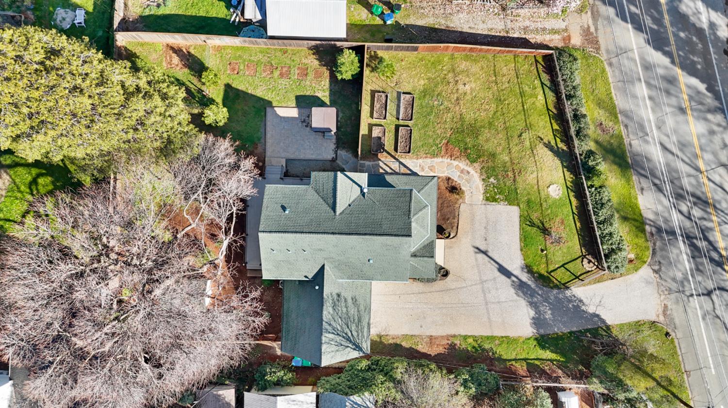 12930 Ridge Road Grass Valley, CA 95945 - Photo 56 of 62 a view of building and tree in the background