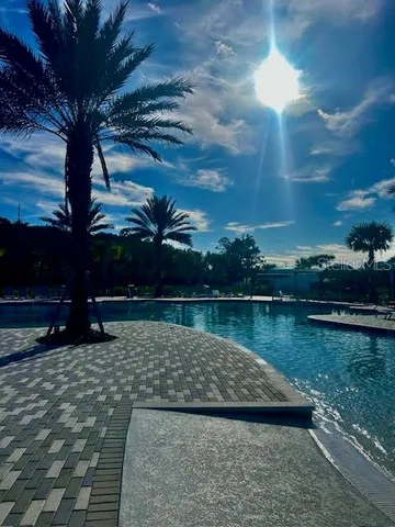 a view of a lake with a building in the background
