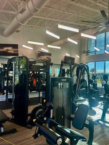 a view of swimming pool with seating area