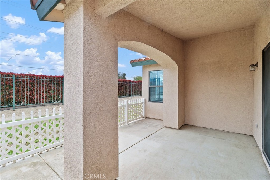 1078 Merrill Circle Hemet, CA 92545 - Photo 24 of 33 a view of an empty room with a balcony