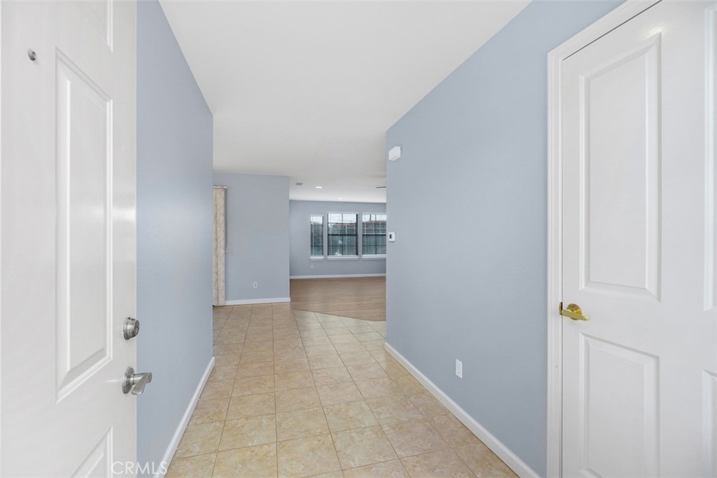 1078 Merrill Circle Hemet, CA 92545 - Photo 5 of 33 a view of an empty room with a window