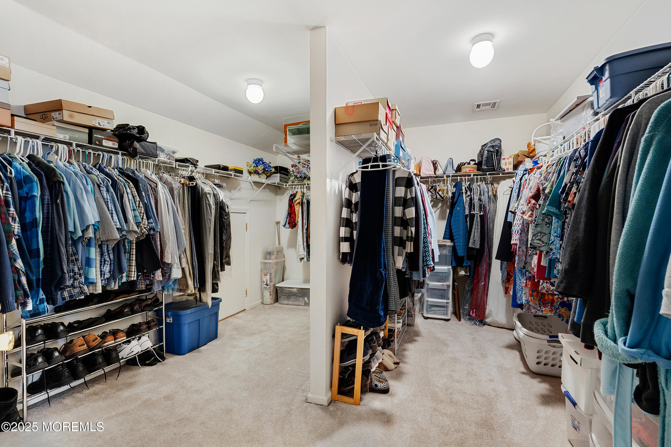 18 Serendipity Drive Jackson, NJ 08527 - Photo 27 of 46 a view of walk in closet with clothes
