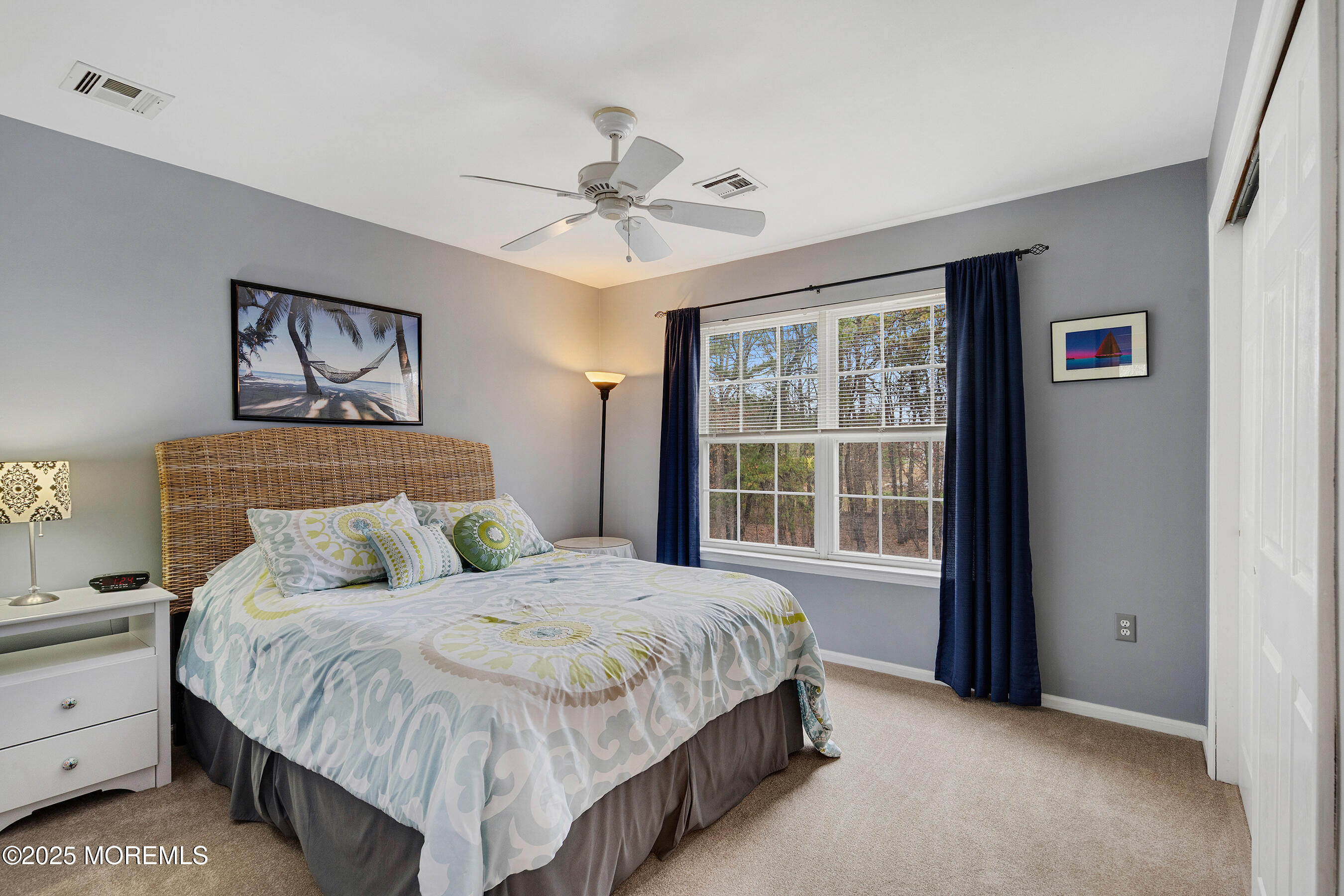 18 Serendipity Drive Jackson, NJ 08527 - Photo 29 of 46 a bedroom with a large bed and a window