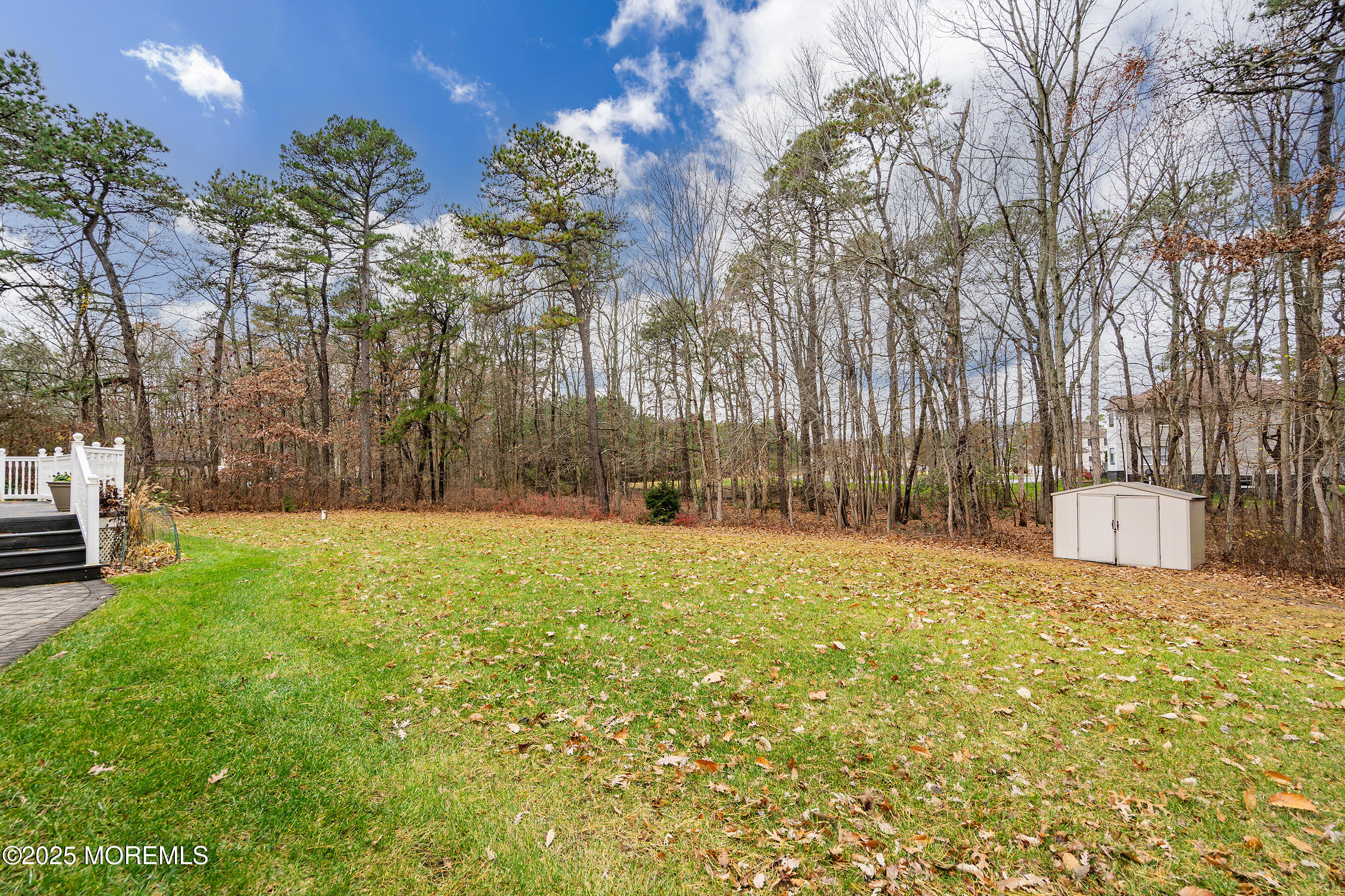 18 Serendipity Drive Jackson, NJ 08527 - Photo 35 of 46 a view of swimming pool with an outdoor seating and a yard