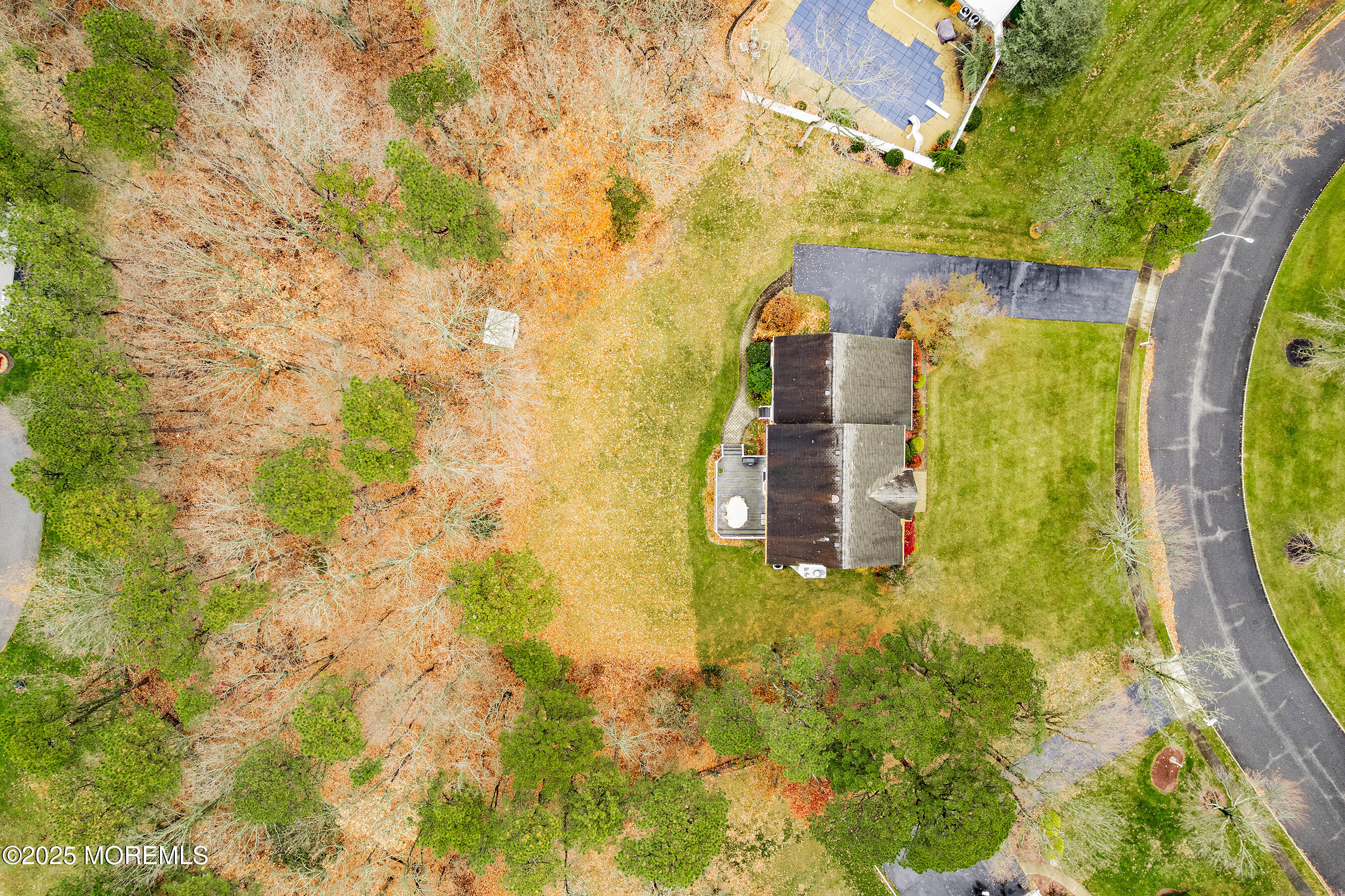 18 Serendipity Drive Jackson, NJ 08527 - Photo 39 of 46 a yellow building with trees in front of it
