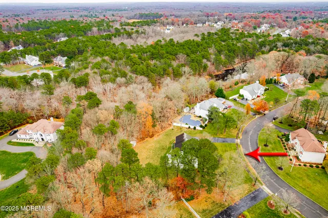 an aerial view of residential building and lake view