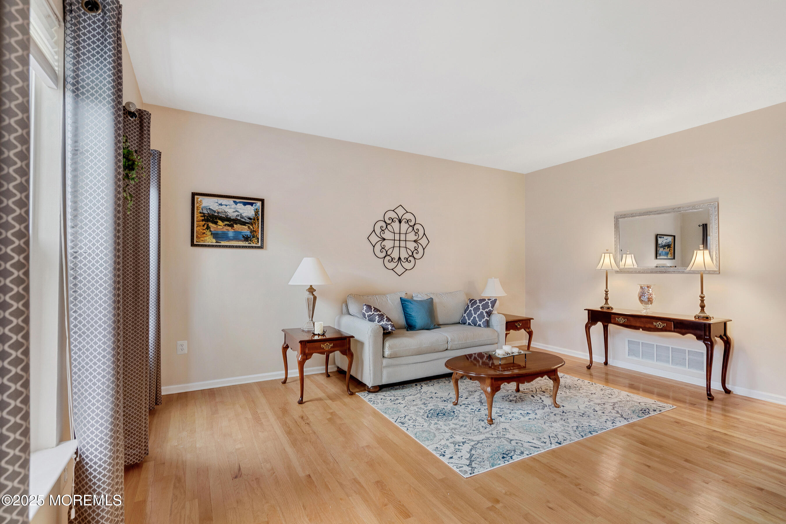 18 Serendipity Drive Jackson, NJ 08527 - Photo 7 of 46 a living room with furniture and a table