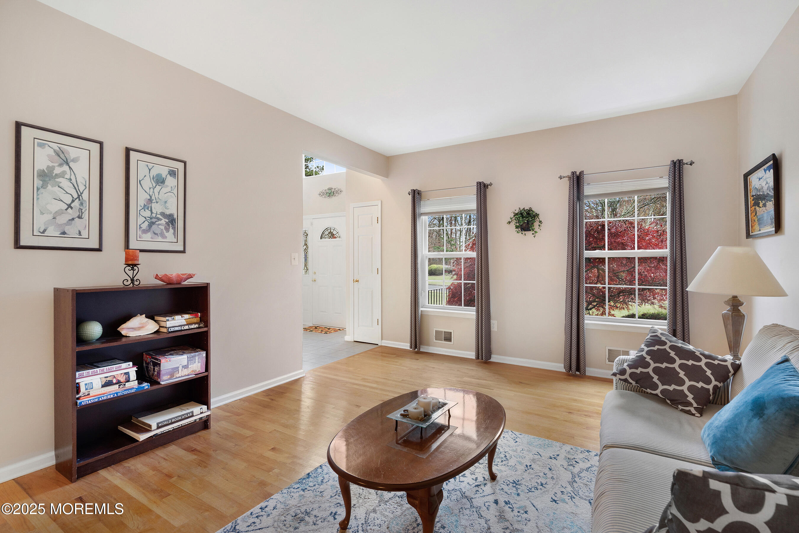 18 Serendipity Drive Jackson, NJ 08527 - Photo 8 of 46 a living room with furniture and a wooden floor