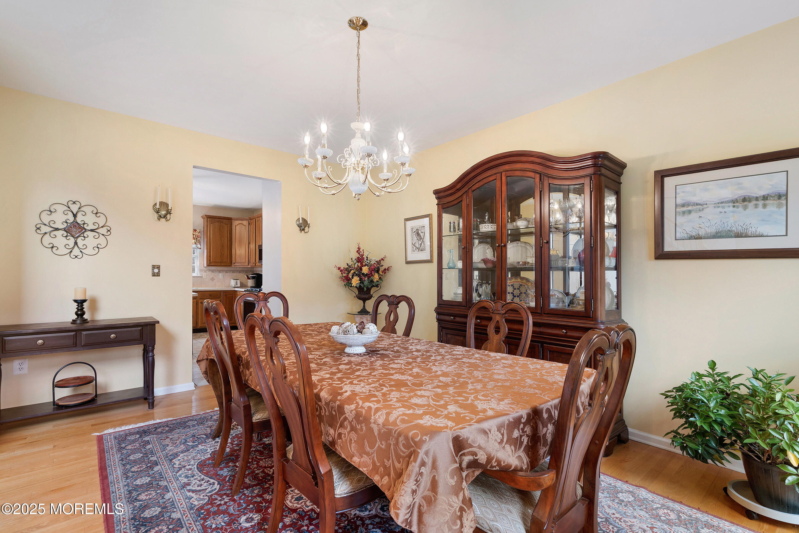 18 Serendipity Drive Jackson, NJ 08527 - Photo 10 of 46 a view of a dining room with furniture and chandelier