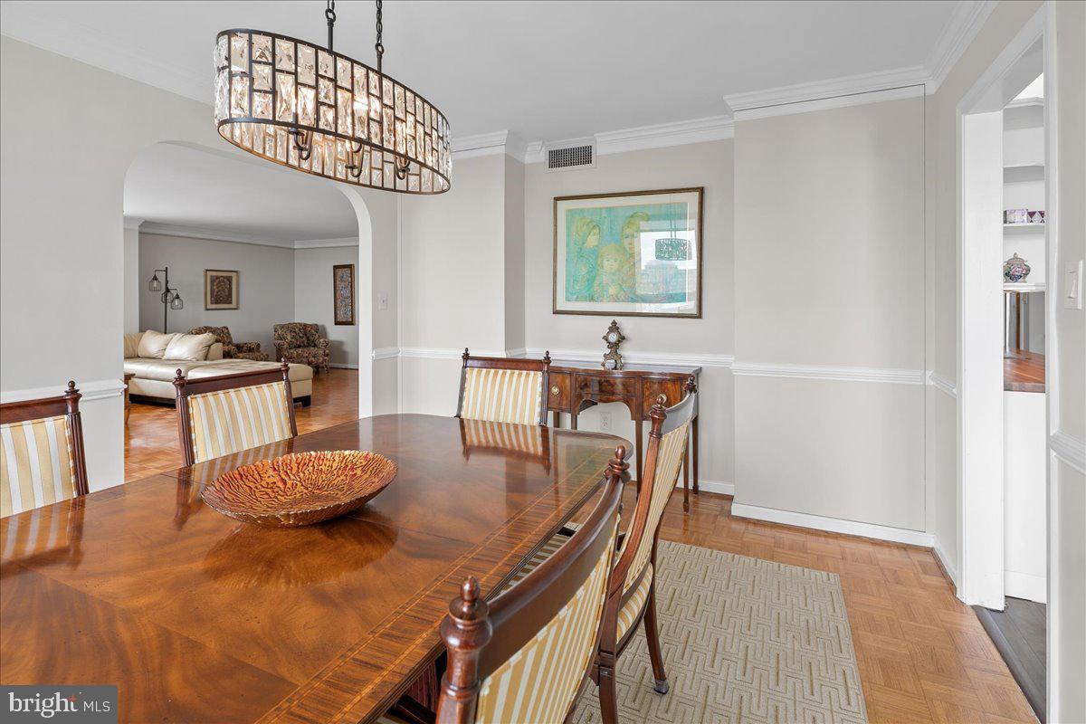 1101 South Arlington Ridge Road, Unit 402 Arlington, VA 22202 - Photo 21 of 61 Elegant dining space with modern charm.