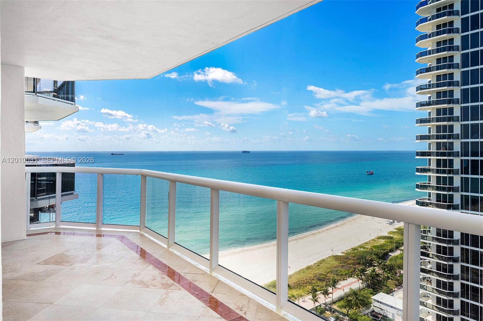 4779 Collins Avenue, Unit 2404 Miami Beach, FL 33140 - Photo 19 of 26 a view of balcony with furniture