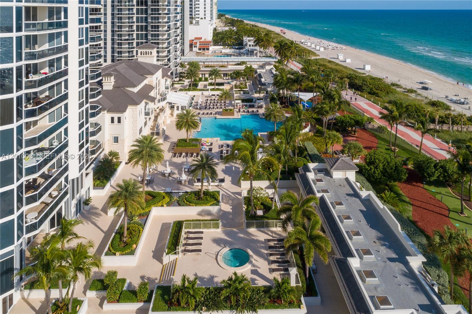 4779 Collins Avenue, Unit 2404 Miami Beach, FL 33140 - Photo 26 of 26 an aerial view of residential houses with outdoor space