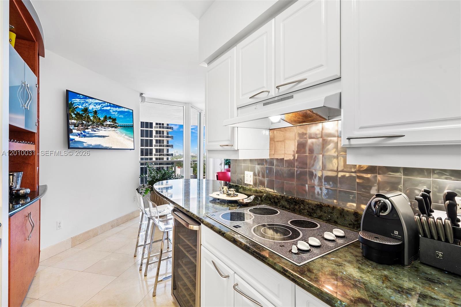 4779 Collins Avenue, Unit 2404 Miami Beach, FL 33140 - Photo 5 of 26 a room with musical instruments