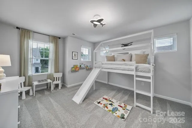 a room with furniture and a window