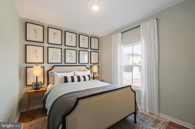 a bed room with a bed and a window